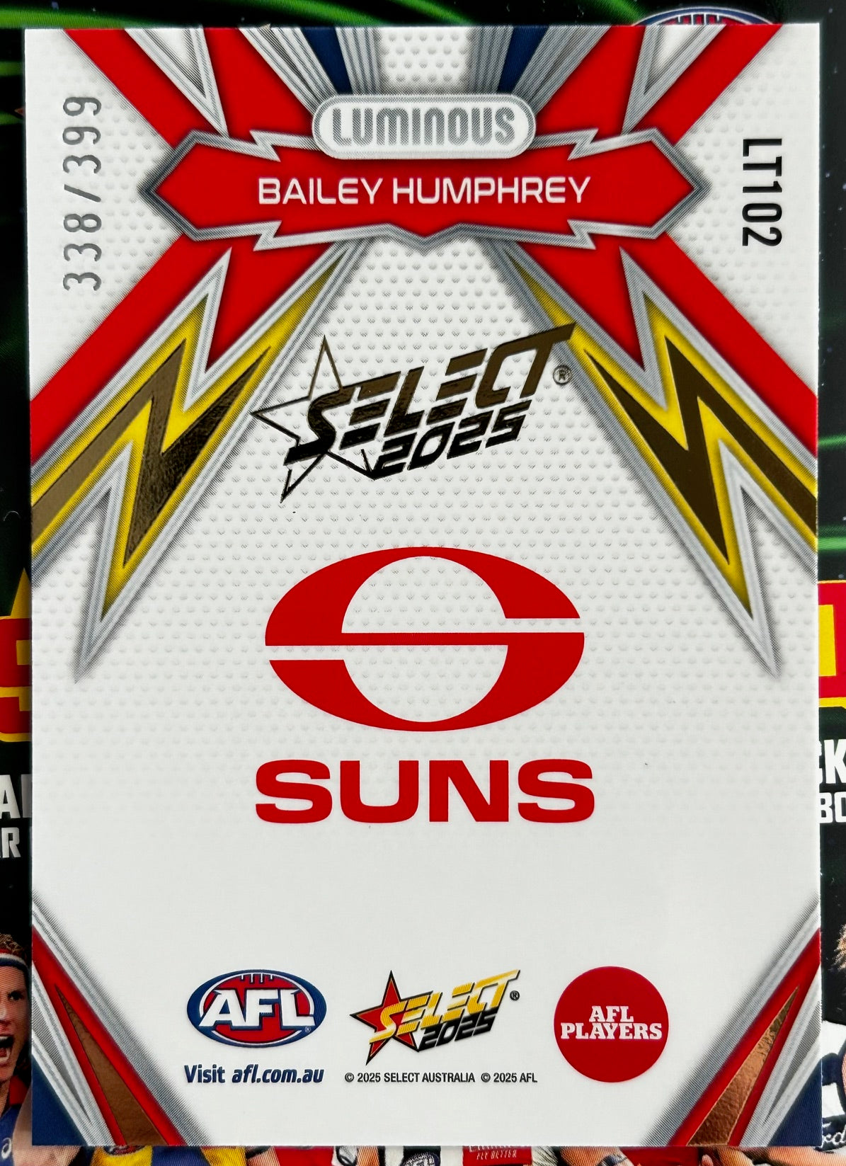 Select AFL 2025 Footy Stars - BAILEY HUMPHREY (GOLD COAST SUNS) Thunderbolt Gold Logo LT102 /399