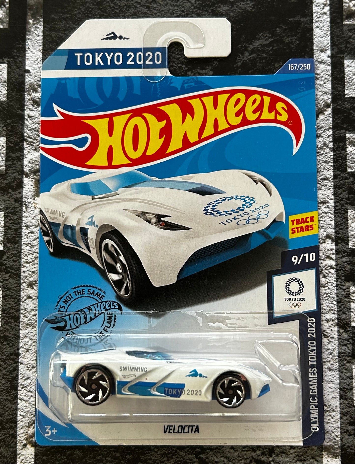 Mattel Hot Wheels Diecast Basic 1:64 - Velocita Olympic Games Tokyo 2020