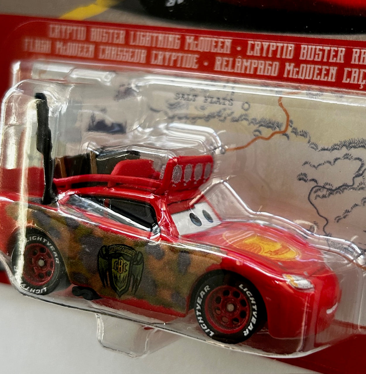 Mattel Disney Cars On The Road Metal 1:55 Diecast - CRYPTID BUSTER LIGHTNING McQUEEN