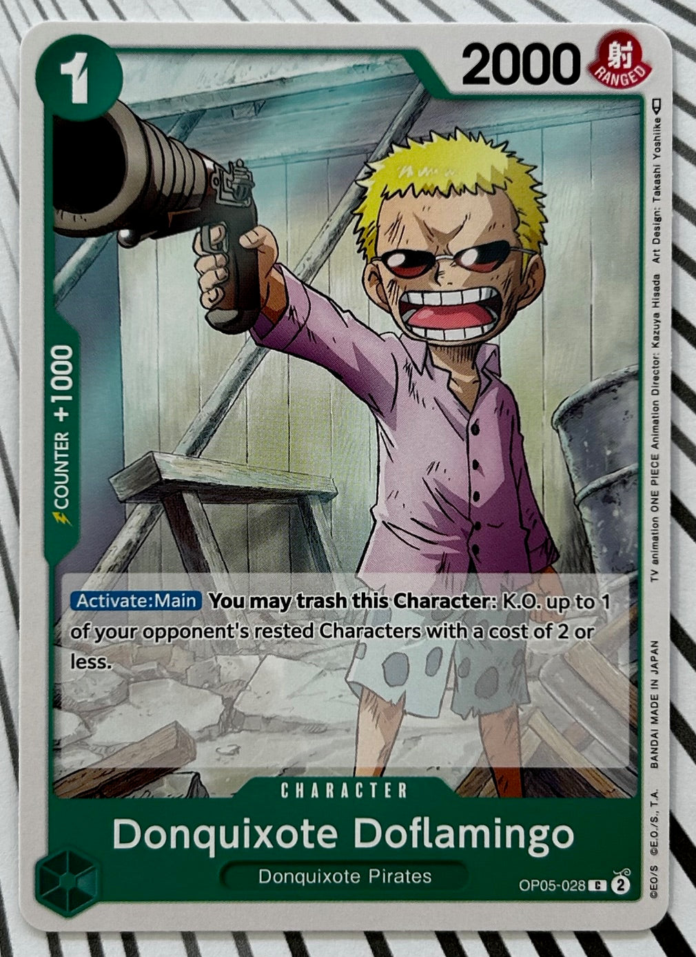 OP05-028 DONQUIXOTE DOFLAMINGO One Piece Character Card (Green) English